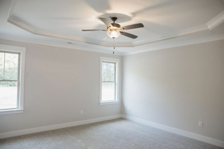 Interior primary bedroom view of the Tyler Home Plan, 1731 square feet built by Neuse River Homes.