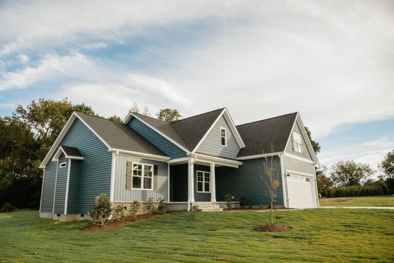 Exterior side view of 100 Lucky Lane in the Bartlett Farm neighborhood built by Neuse River Homes