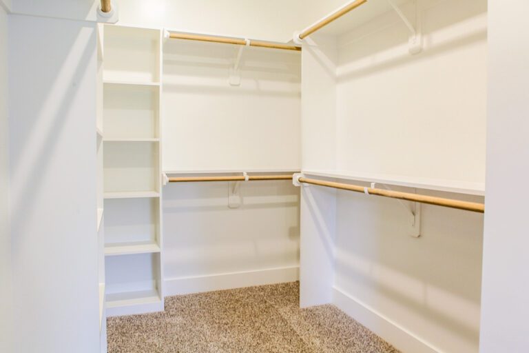 Primary closet view of a new construction home at 289 Tee Drive in Honaker Farms, Selma NC built by Neuse River Homes