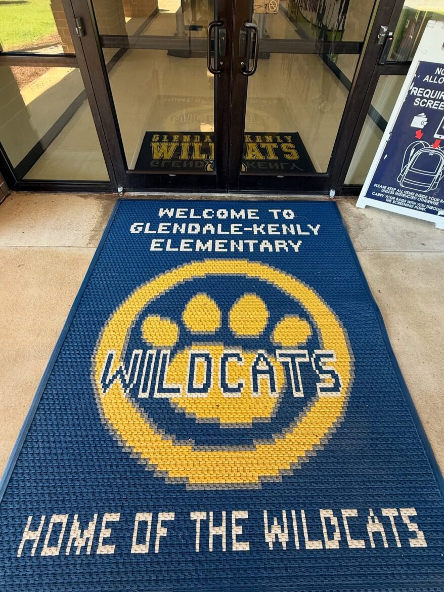 Welcome mat at Glendale-Kenly Elementary School featuring Wildcats mascot and school name.