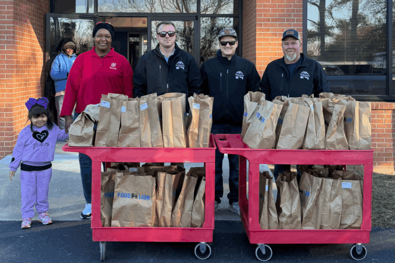 Neuse River Homes team members donating food and winter essentials to The Salvation Army of Goldsboro, NC